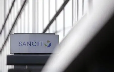 A logo is seen in front of the entrance at the headquarters French drugmaker Sanofi in Paris October 30, 2014. REUTERS/Christian Hartmann